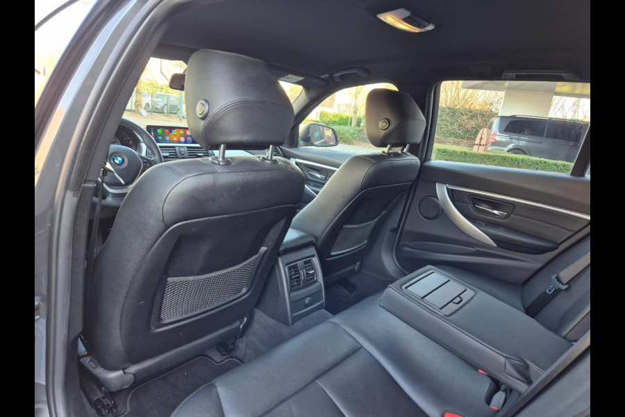 BMW 3 Serie Touring Nbt EVO Apple CarPlay LM Velgen Trekhaak NAP NL Gave Kleur 320i Luxury Edition