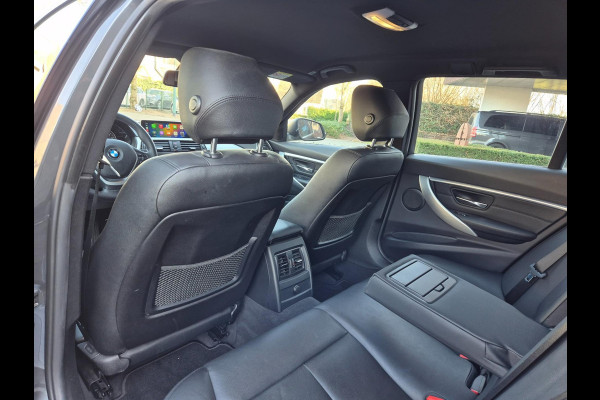 BMW 3 Serie Touring Nbt EVO Apple CarPlay LM Velgen Trekhaak NAP NL Gave Kleur 320i Luxury Edition