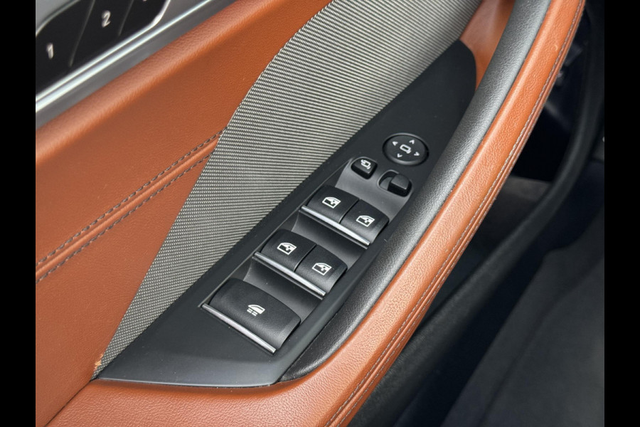 BMW 8 Serie M850i xDrive High Executive / 20 Inch / Active Cruise control / M Carbon exterieur / Soft close / Active Steering / Laserlicht