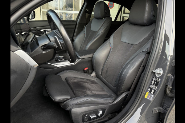BMW 3-serie 320e M SPORT | 19 INCH VELGEN | PANORAMA | M SPORT REMMEN | TREKHAAK | ELEKTR. STOELEN MEMORY |