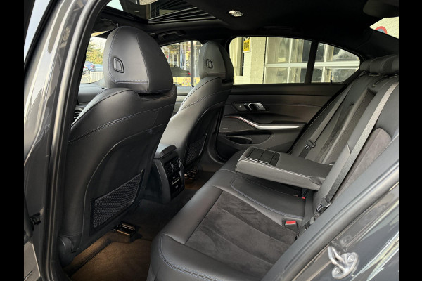 BMW 3-serie 320e M SPORT | 19 INCH VELGEN | PANORAMA | M SPORT REMMEN | TREKHAAK | ELEKTR. STOELEN MEMORY |