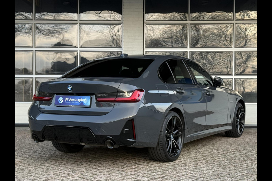 BMW 3-serie 320e M SPORT | 19 INCH VELGEN | PANORAMA | M SPORT REMMEN | TREKHAAK | ELEKTR. STOELEN MEMORY |