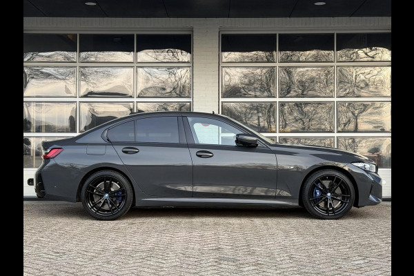 BMW 3-serie 320e M SPORT | 19 INCH VELGEN | PANORAMA | M SPORT REMMEN | TREKHAAK | ELEKTR. STOELEN MEMORY |