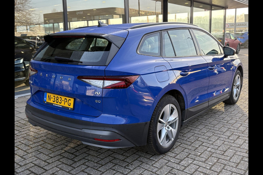 Škoda ENYAQ iV 60 | Wegklapbare trekhaak | Stoelverwarming | Achteruitrijcamera | Warmtepomp