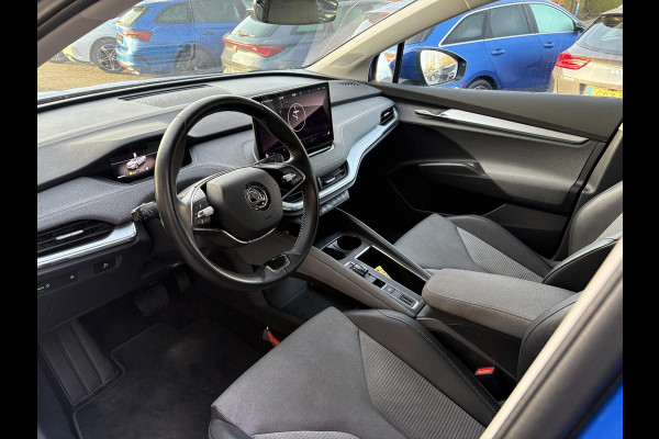 Škoda ENYAQ iV 60 | Wegklapbare trekhaak | Stoelverwarming | Achteruitrijcamera | Warmtepomp