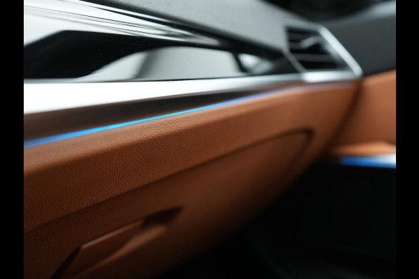BMW 3 Serie Touring 320e Plug In Hybrid 204pk Dealer O.H. PHEV | Panodak | Widescreen Navi | Camera | Lederen Sportstoelen Verwarmd | Sfeerverlichting | Apple Carplay | Navigatie | Virtual | DAB | Tansanitblau II Metallic |