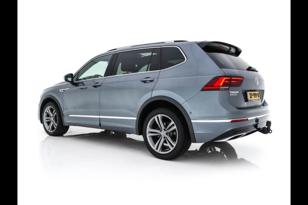 Volkswagen Tiguan Allspace 1.5 TSI R-line Highline Business (7-Pers.) (INCL-BTW) Aut * PANO | NAVI-FULLMAP | XENON | ALCANTARA | HEATED-ERGONOMIC-SPORTSEATS | KEYLESS | PRIVACY-GLASS | CAMERA | DAB | DIGI-COCKPIT | PDC | TOWBAR | ECC | 19"ALU*