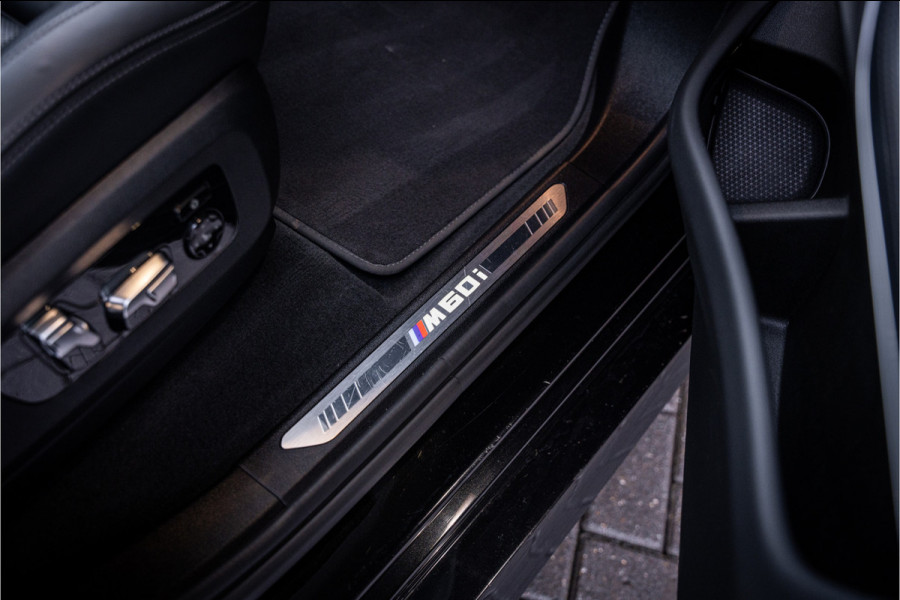 BMW X7 M60i xDrive - Panorama | Kuipstoelen | H&K | Exclusive Pakket | Elek Trekhaak