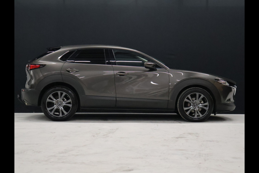Mazda CX-30 2.0 e-SkyActiv-X M Hybrid Luxury [ADAPTIVE CRUISE, BLUETOOTH, CAMERA, ELEK STOELEN, VOL LEDER, STOEL EN STUURVERWARMING, BOSE AUDIO, ELEK.. ACHTERKLEP, HEAD UP, TREKHAAK,CLIMATE, NAV, NIEUWSTAAT]