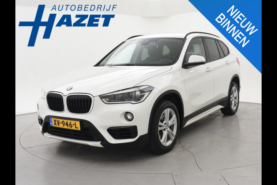 BMW X1 sDrive18i AUT. SPORTLINE + TREKHAAK | LED | SPORTSTOELEN | STOELVERWARMING | NAVIGATIE