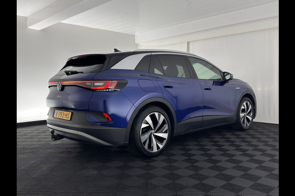 Volkswagen ID.4 First 77 kWh [ 3-Fase ] {SOH-83%} (INCL.BTW) *LEATHER-MICROFIBRE | FULL-LED | ADAPTIVE-CRUISE | HEATED-COMFORTSEATS | DIGI-COCKPIT | AMBIENT-LIGHT | NAVI-FULLMAP | PDC | TOWBAR | PRIVACY-GLASS | CAMERA | 20''ALU*