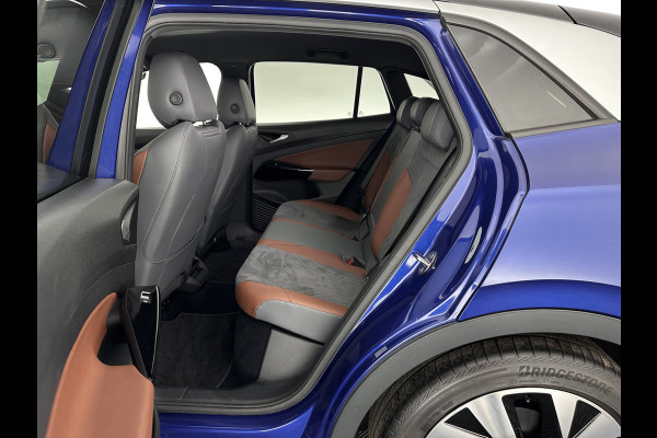 Volkswagen ID.4 First 77 kWh [ 3-Fase ] {SOH-83%} (INCL.BTW) *LEATHER-MICROFIBRE | FULL-LED | ADAPTIVE-CRUISE | HEATED-COMFORTSEATS | DIGI-COCKPIT | AMBIENT-LIGHT | NAVI-FULLMAP | PDC | TOWBAR | PRIVACY-GLASS | CAMERA | 20''ALU*