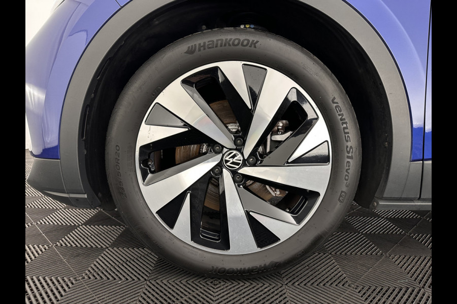 Volkswagen ID.4 First 77 kWh [ 3-Fase ] {SOH-83%} (INCL.BTW) *LEATHER-MICROFIBRE | FULL-LED | ADAPTIVE-CRUISE | HEATED-COMFORTSEATS | DIGI-COCKPIT | AMBIENT-LIGHT | NAVI-FULLMAP | PDC | TOWBAR | PRIVACY-GLASS | CAMERA | 20''ALU*