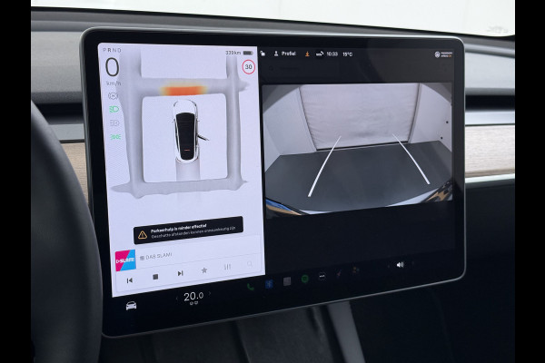 Tesla Model Y RWD Warmtepomp LFP-Accu Leer Lmv Camera's Pano-dak Adap.Cruise Navi Ecc Autopilot Stoel+Stuur+Achterbank Verwarming Elek.Achterklep Dodehoek detector Draadloze telefoonlader SOH 93% 1e Eigenaar Origineel Nederlandse Auto 1.600KG Trekgewicht