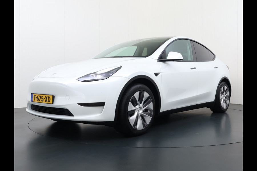 Tesla Model Y RWD Warmtepomp LFP-Accu Leer Lmv Camera's Pano-dak Adap.Cruise Navi Ecc Autopilot Stoel+Stuur+Achterbank Verwarming Elek.Achterklep Dodehoek detector Draadloze telefoonlader SOH 93% 1e Eigenaar Origineel Nederlandse Auto 1.600KG Trekgewicht