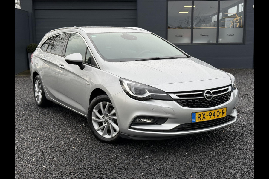 Opel Astra Sports Tourer 1.4 Innovation Dealer Onderhouden,Trekhaak,Navi,Camera,Halfleder,150pk,Rijstrooksensor,Clima,Cruise,PDC V+A,Keyless,BSD,Elekt.Stoel,Nieuwe Apk bij Aflevering