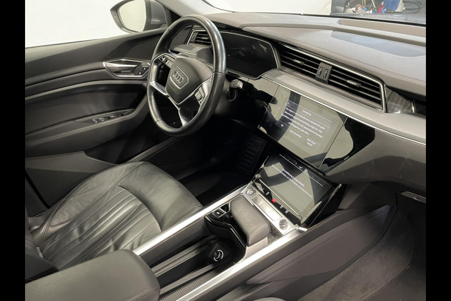 Audi e-tron 50 quattro Business edition Plus 71 kWh | Panoramadak | Navigatie | Parkeersensoren | Adaptive Cruise Control | Memory stoelen | Stoelverwarming | Full Led | Climate Control | Virtual Cockpit | Lichtmetalen velgen