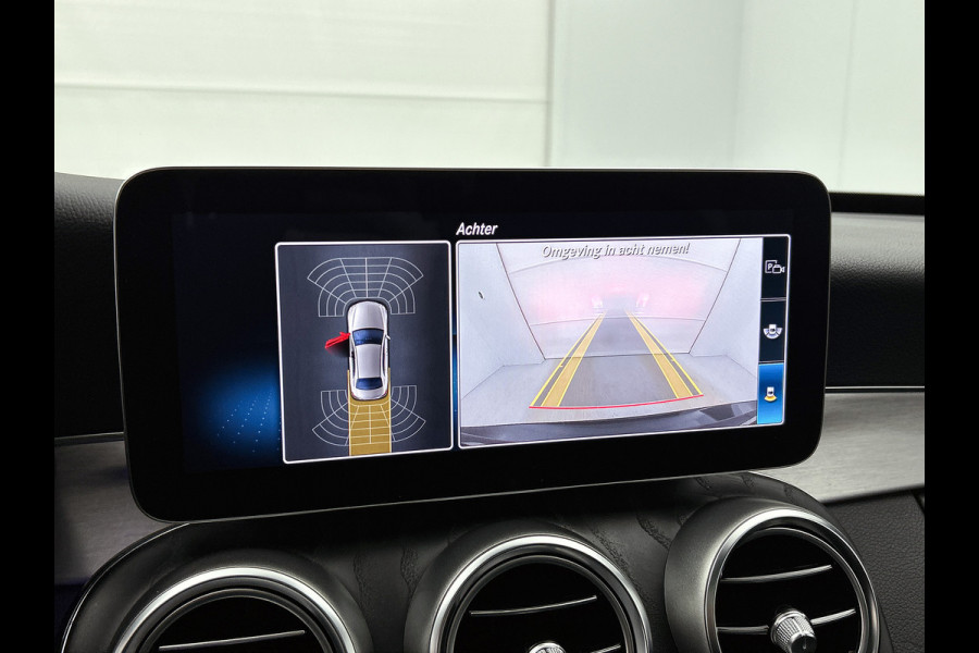 Mercedes-Benz C-Klasse 200 Business Solution AMG Lichtmetalen velgen | Navigatie | Trekhaak | Parking support met camera achter | Inclusief 24 maanden MB Certified garantie voor Europa.