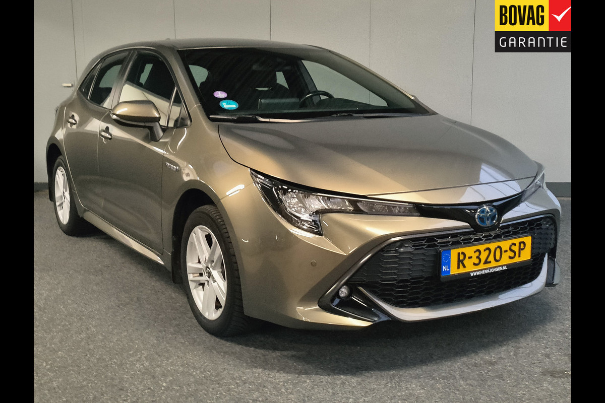 Toyota Corolla 1.8 Hybrid Active Rijklaar + 12 maanden Bovag-garantie Henk Jongen Auto's in Helmond,  al 50 jaar service zoals 't hoort!
