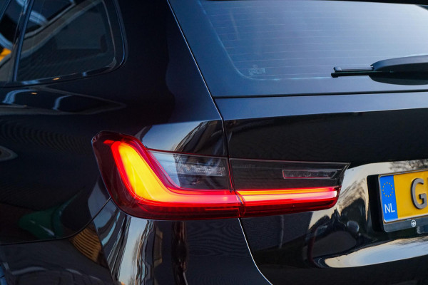 BMW 3 Serie Touring 320d High Executive