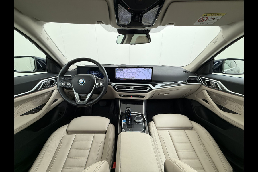 BMW i4 eDrive40 340pk High Executive 84 kWh SOH 99% Pano-Dak/Hefdak SportSt+Leer+(Stuur+)Verwarmd 360°Camera Adaptive-Cruise+s&go Park- Semi-Autopilot Drive-Assist-pro Active-Guard-Plus Elektr.Achterklep Draadl-Lader BAS ESP BMW Individual interieurlijsten Pianolak schwarz BMW Individual Exterieur Line Aluminium satiniert BMW Copilot-pack Dodehoekdetectie/correctie, Kruisend-verkeer-Detectie, rijstrooksensor met correctie, rondomzicht camera, uitwijk assistent) 0-100 5,6 sec. 1600kg trekvermogen! € 73.000 nieuw