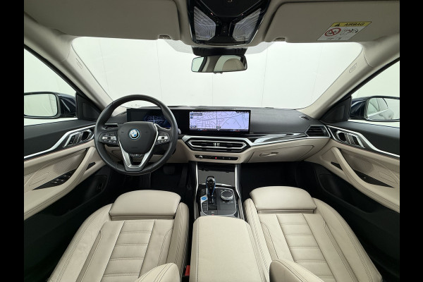 BMW i4 eDrive40 340pk High Executive 84 kWh SOH 99% Pano-Dak/Hefdak SportSt+Leer+(Stuur+)Verwarmd 360°Camera Adaptive-Cruise+s&go Park- Semi-Autopilot Drive-Assist-pro Active-Guard-Plus Elektr.Achterklep Draadl-Lader BAS ESP BMW Individual interieurlijsten Pianolak schwarz BMW Individual Exterieur Line Aluminium satiniert BMW Copilot-pack Dodehoekdetectie/correctie, Kruisend-verkeer-Detectie, rijstrooksensor met correctie, rondomzicht camera, uitwijk assistent) 0-100 5,6 sec. 1600kg trekvermogen! € 73.000 nieuw