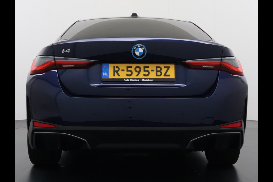 BMW i4 eDrive40 340pk High Executive 84 kWh SOH 99% Pano-Dak/Hefdak SportSt+Leer+(Stuur+)Verwarmd 360°Camera Adaptive-Cruise+s&go Park- Semi-Autopilot Drive-Assist-pro Active-Guard-Plus Elektr.Achterklep Draadl-Lader BAS ESP BMW Individual interieurlijsten Pianolak schwarz BMW Individual Exterieur Line Aluminium satiniert BMW Copilot-pack Dodehoekdetectie/correctie, Kruisend-verkeer-Detectie, rijstrooksensor met correctie, rondomzicht camera, uitwijk assistent) 0-100 5,6 sec. 1600kg trekvermogen! € 73.000 nieuw