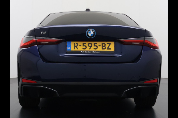 BMW i4 eDrive40 340pk High Executive 84 kWh SOH 99% Pano-Dak/Hefdak SportSt+Leer+(Stuur+)Verwarmd 360°Camera Adaptive-Cruise+s&go Park- Semi-Autopilot Drive-Assist-pro Active-Guard-Plus Elektr.Achterklep Draadl-Lader BAS ESP BMW Individual interieurlijsten Pianolak schwarz BMW Individual Exterieur Line Aluminium satiniert BMW Copilot-pack Dodehoekdetectie/correctie, Kruisend-verkeer-Detectie, rijstrooksensor met correctie, rondomzicht camera, uitwijk assistent) 0-100 5,6 sec. 1600kg trekvermogen! € 73.000 nieuw