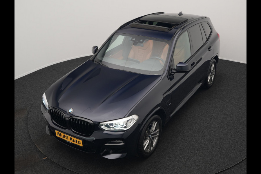 BMW X3 xDrive30e M Sport Plug In Hybrid 292pk Dealer O.H. PHEV | Panodak | Sfeerverlichting | Lederen Sportstoelen Memory & Verwarmd | Stuur Verwarmd | Apple Carplay | Keyless | Cruise Control | Navigatie | DAB | 19"L.M |