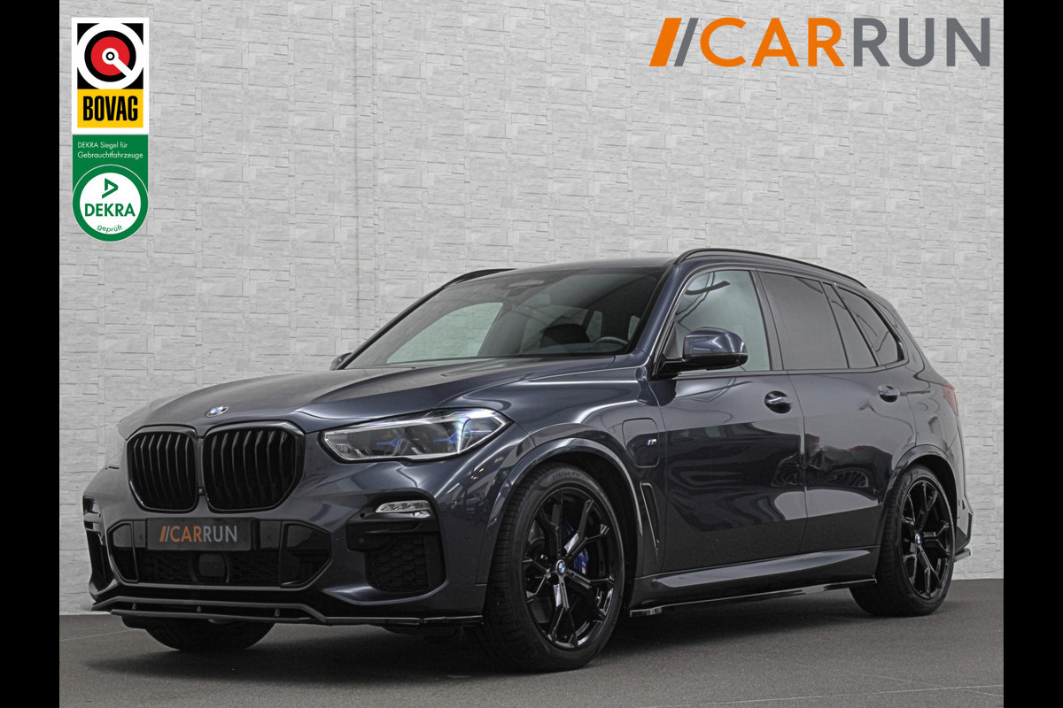 BMW X5 45e M-Stoelen | M-Performance | 360 Camera | ACC | Indiv. Leder | Harman-Kardon | Laser-LED | Keyless-Entry | Stoelventilatie | Head-Up | Memory | 21'' | Sfeerverlichting | Trekhaak | Luchtvering | Rij-Assistent Pro | Carplay | Black-Optic | Draadloos Laden.