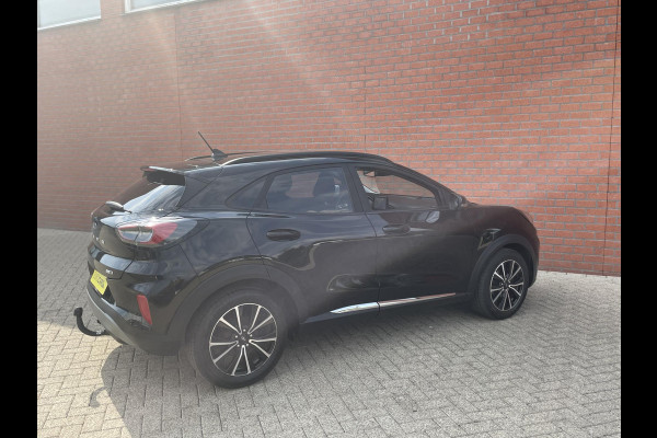 Ford Puma 1.0 EcoBoost 125pk MHEV Titanium | Navigatie | Apple Carplay/Android Auto | Parkeersensor achter | Cruise Control | Winter Pack | Comfort Pack | Getinte ramen | Trekhaak