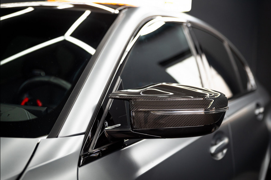 BMW 3 Serie M3 xDrive Competition / Frozen / Carbon / H&K / Laser / ACC / Curved display / Stoelverk. / Garantie