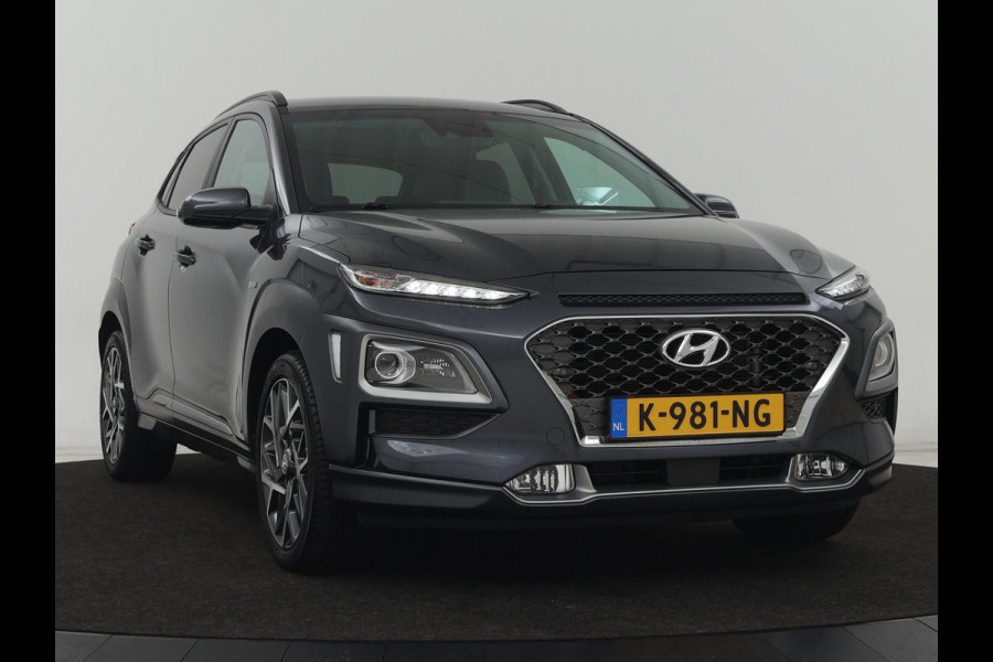 Hyundai Kona 1.6 GDI HEV Premium | Leder | Stoelventilatie | Adaptive cruise | Head-Up | Carplay | Camera | Achterbankverwarming | Navigatie | Keyless | Climate control