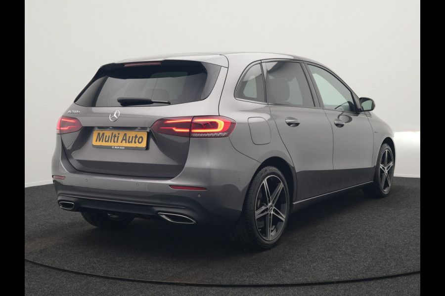 Mercedes-Benz B-Klasse 250 e Progressive Plug In Hybrid 218pk Dealer O.H. PHEV | Camera | Night Pakket | Sfeerverlichting | Widescreen Navi | Sportstoelen Memory & Verwarmd | Apple Carplay | Blis | Cruise Control | Navigatie | DAB |