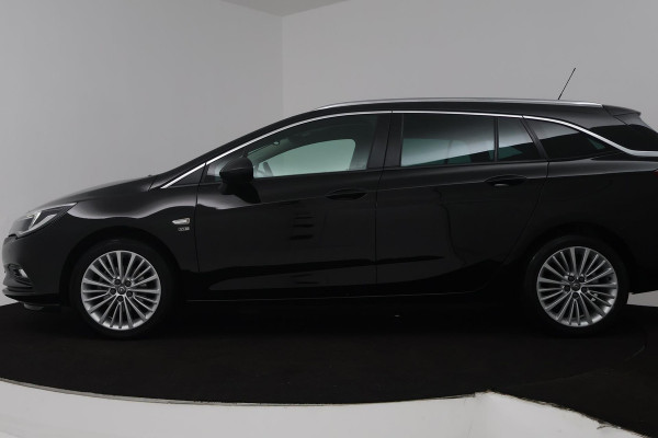 Opel Astra Sports Tourer 1.4 Turbo 120 Jaar Edition (TREKHAAK, PARKEERSENSOREN, CRUISE CONTROL, NAVIGATIE)