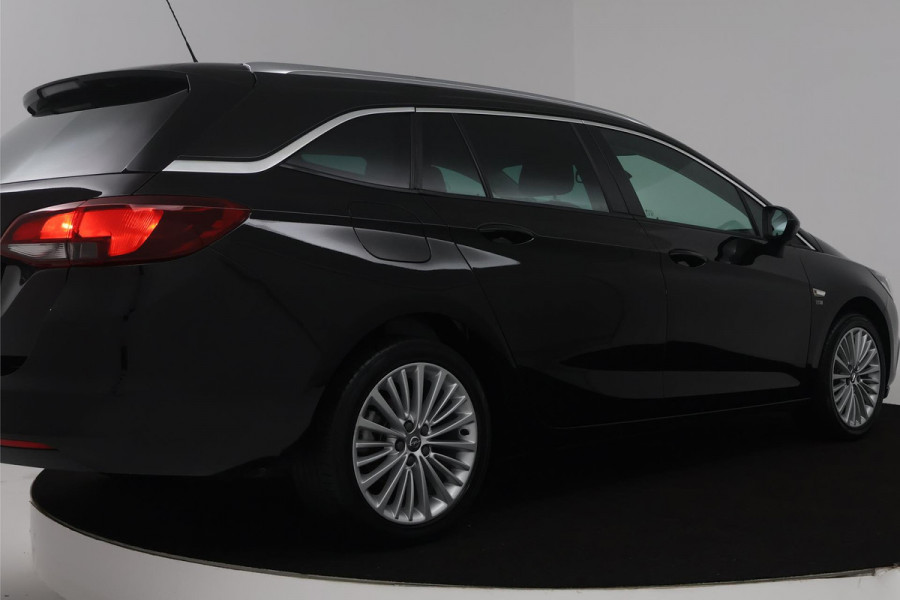 Opel Astra Sports Tourer 1.4 Turbo 120 Jaar Edition (TREKHAAK, PARKEERSENSOREN, CRUISE CONTROL, NAVIGATIE)