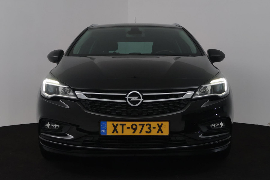 Opel Astra Sports Tourer 1.4 Turbo 120 Jaar Edition (TREKHAAK, PARKEERSENSOREN, CRUISE CONTROL, NAVIGATIE)
