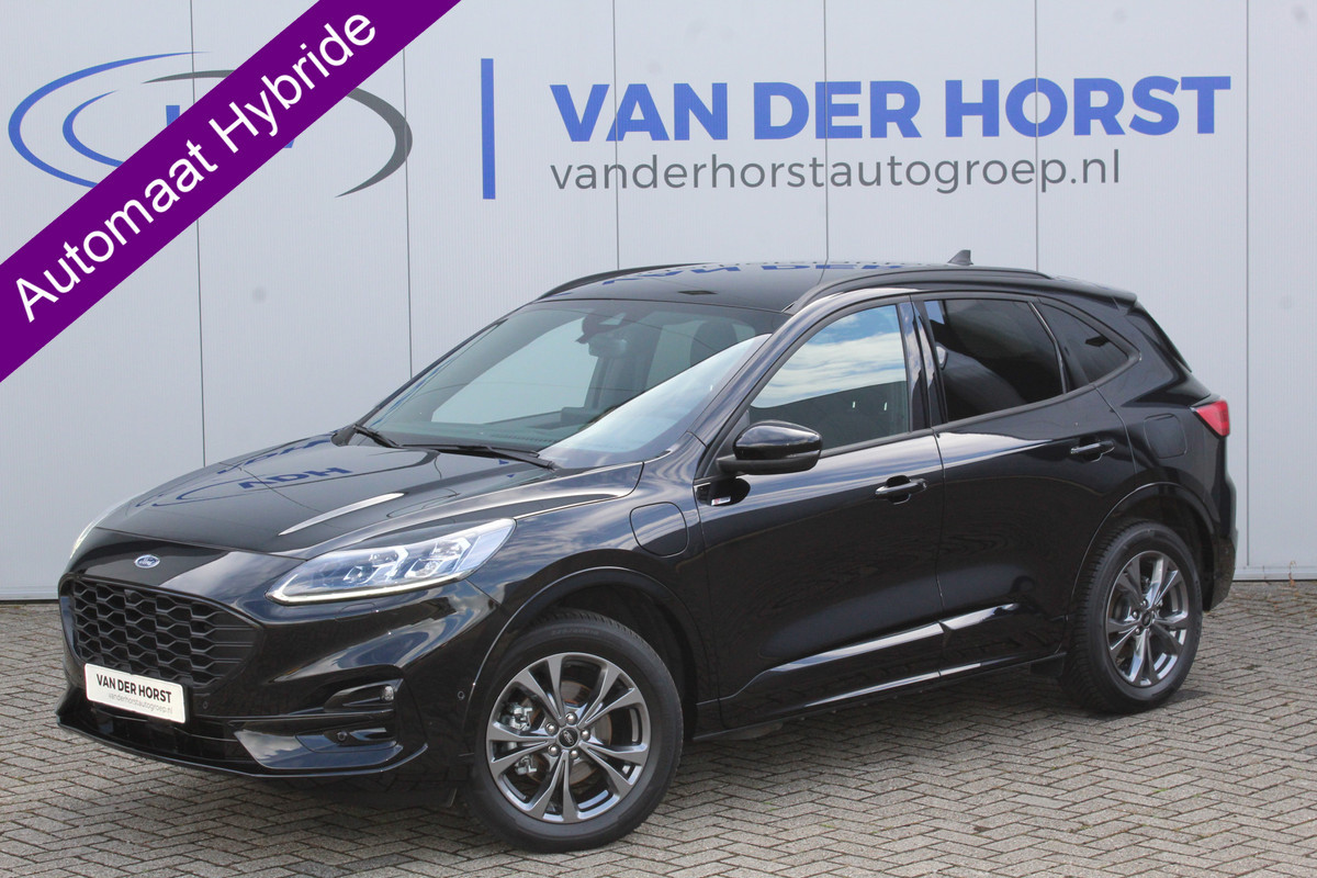Ford Kuga 2.5-225pk Plug-in Hybrid ST-Line X. Hybride rijden voor een reële prijs ! Adaptive Cruise Control, Stoel- en voorraamverwarming, Climate Control, Metallic lak, Camera v+a, Elektr. achterklep, Side- en lane assist etc.