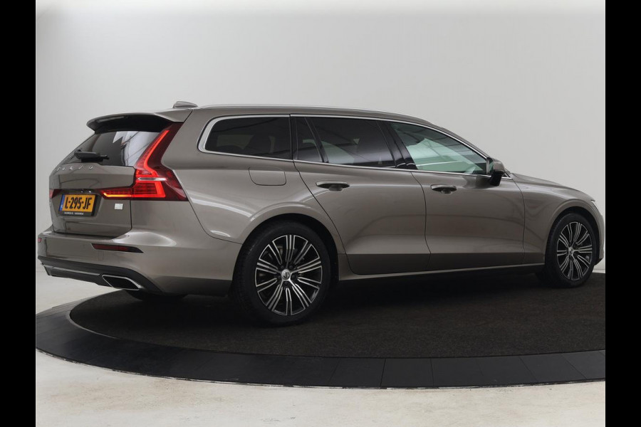 Volvo V60 2.0 T6 AWD Recharge Business Pro | Leder | Trekhaak | Stoel & stuurverwarming | Adaptive cruise | Camera | Carplay | Navigatie | Full LED | Parkeerhulp | PHEV | Plug In
