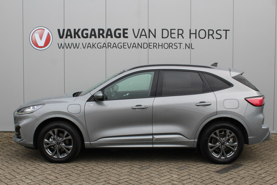 Ford Kuga 2.5-225 PK PHEV ST-Line X. Hybride rijden voor een reële prijs ! Autm. airco, Stoel- en voorraamverw., Side- en lane assist, Adaptieve cruise cntrl, elektr. achterklep, Keyless entry/keyless go, Trekhaak afneemb., Navigatie, Telefoonvoorb. etc