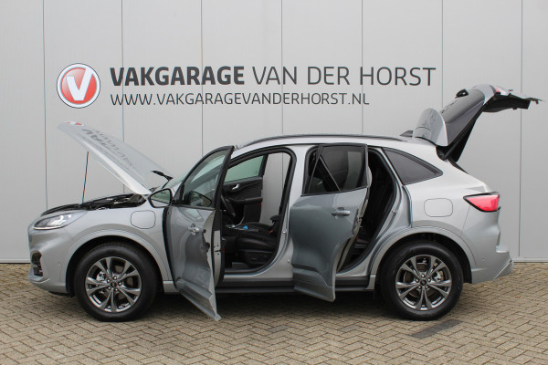 Ford Kuga 2.5-225 PK PHEV ST-Line X. Hybride rijden voor een reële prijs ! Autm. airco, Stoel- en voorraamverw., Side- en lane assist, Adaptieve cruise cntrl, elektr. achterklep, Keyless entry/keyless go, Trekhaak afneemb., Navigatie, Telefoonvoorb. etc