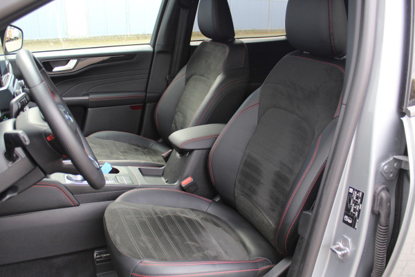 Ford Kuga 2.5-225 PK PHEV ST-Line X. Hybride rijden voor een reële prijs ! Autm. airco, Stoel- en voorraamverw., Side- en lane assist, Adaptieve cruise cntrl, elektr. achterklep, Keyless entry/keyless go, Trekhaak afneemb., Navigatie, Telefoonvoorb. etc