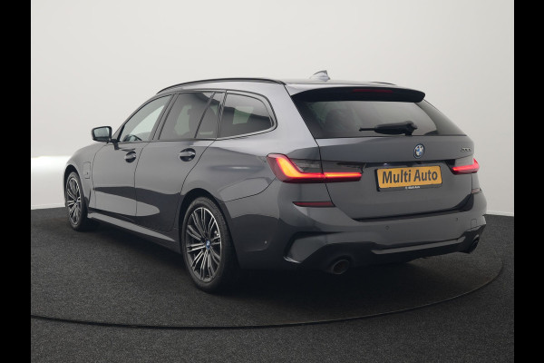 BMW 3 Serie Touring 330e M Sport Plug In Hybrid 293pk Dealer O.H PHEV | Trekhaak Af Fabriek | Panodak | 360 Camera | Alcantara Sportstoelen Memory & Verwarmd | Apple Carplay | Sfeerverlichting | Virtual | Blis | Navigatie | DAB |