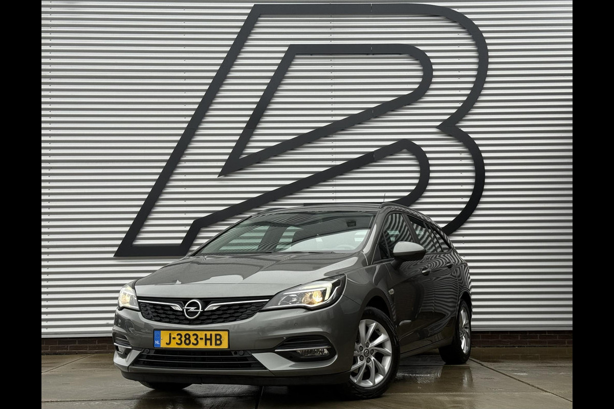 Opel Astra Sports Tourer 1.2 Business Edition 2e Eigenaar,Apple Carplay,Airco,Camera,Cruise,PDC,Trekhaak,N.A.P,APK tot 07-2026