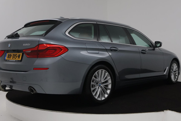 BMW 5 Serie Touring 520i High Executive (PANORAMADAK, STOELVERWARMING, TREKHAAK, ELEKTR STOELEN, HEAD-UP, ACHTERUITRIJCAMERA)