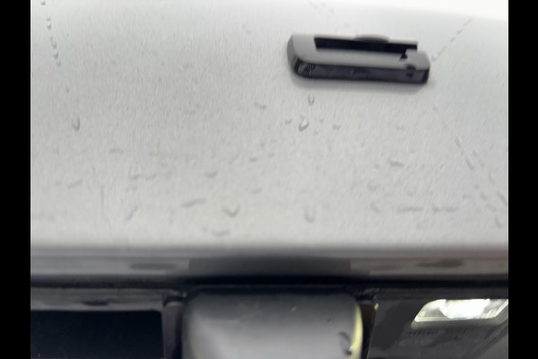 Ford Kuga 2.5 PHEV ST-Line X 243pk | orig. NL auto | Panoramadak | Wegklapbare trekhaak | Winter Pack | 19 inch | Adaptieve LED | Head up Display | Solar Silver