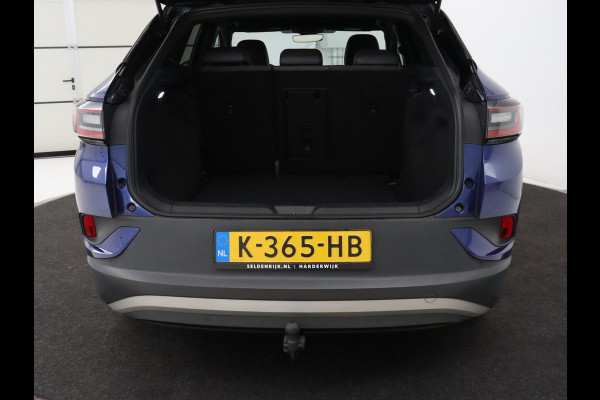 Volkswagen ID.4 First 77 kWh | Trekhaak | Stoel & stuurverwarming | Adaptive cruise | Camera | Carplay | Half leder | Navigatie | 20'' | Full LED | Keyless | Climate control | Sfeerverlichting