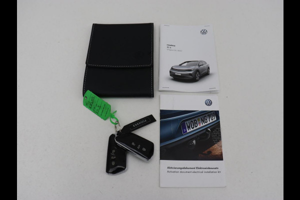 Volkswagen ID.4 First 77 kWh | Trekhaak | Stoel & stuurverwarming | Adaptive cruise | Camera | Carplay | Half leder | Navigatie | 20'' | Full LED | Keyless | Climate control | Sfeerverlichting