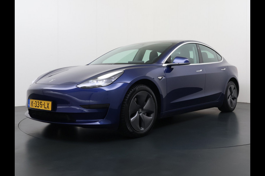 Tesla Model 3 RWD SR plus 325PK SOH 93% Lmv 18" AutoPilot FSD Leder Panoramadak Adaptive-Cruise Camera's Elektr.-Stuur+Stoelen+Spiegels+Geheug Navi LED Comfortstoelen ACC DAB Voorverwarmen interieur via App Keyless One-Pedal-Drive Origineel Nederlandse auto tot 11kw laden thuis!
