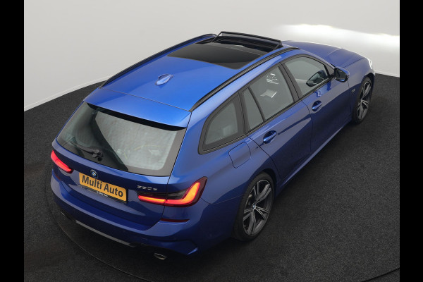 BMW 3 Serie Touring 330e M Sport Plug In Hybrid 293pk Dealer O.H. PHEV | Panodak | Head Up | Laser LED | Adaptief Onderstel | Camera | Alcantara Sportstoelen Memory & Verwarmd | Sfeerverlichting | Apple Carplay | Keyless | Blis | 19"L.M | Virtual | DAB |